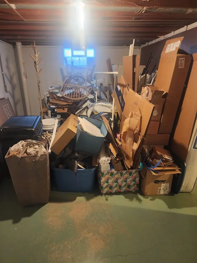 Roll-off dumpster container at job site for 4 Yard Dumpster Rental in East Manchester